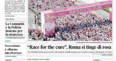 Front page of a bilingual newspaper 'Corriere Canadese' with large Italian headline about Iran and Ukraine seeking peace and a crowd photo labeled 'Race for the Cure' in Rome.