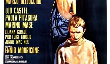 Poster for the Italian film 'I pugni in tasca' with bold title, yellow cast list, and two figures in foreground.