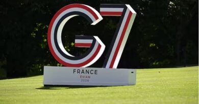 Large G7 sculpture on a green lawn with a white pedestal reading FRANCE EVIAN 2026.